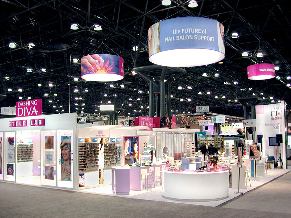 trade show booth design for CosmoProf North America features product merchandising and modular workstation system and retail store prototype